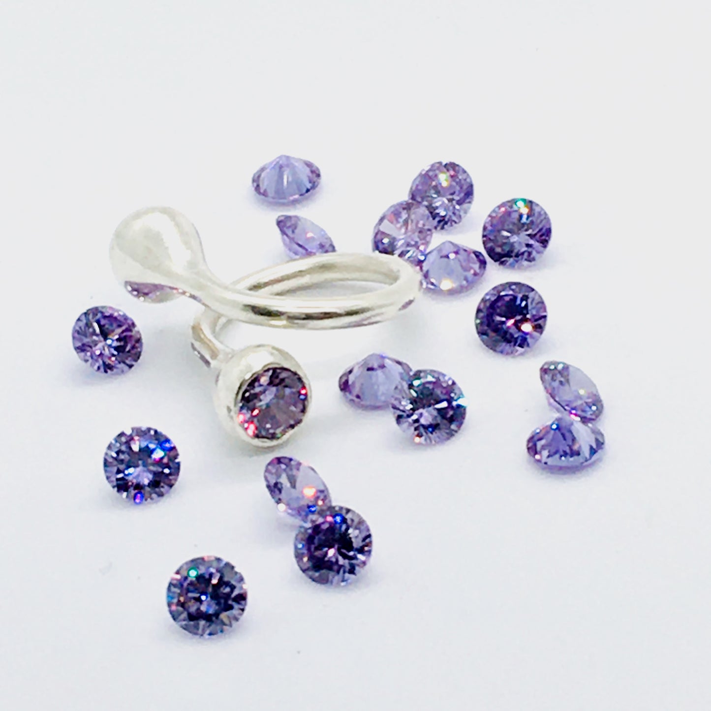 Twisted Gum Nut Ring with Lavender Cubic Zirconia
