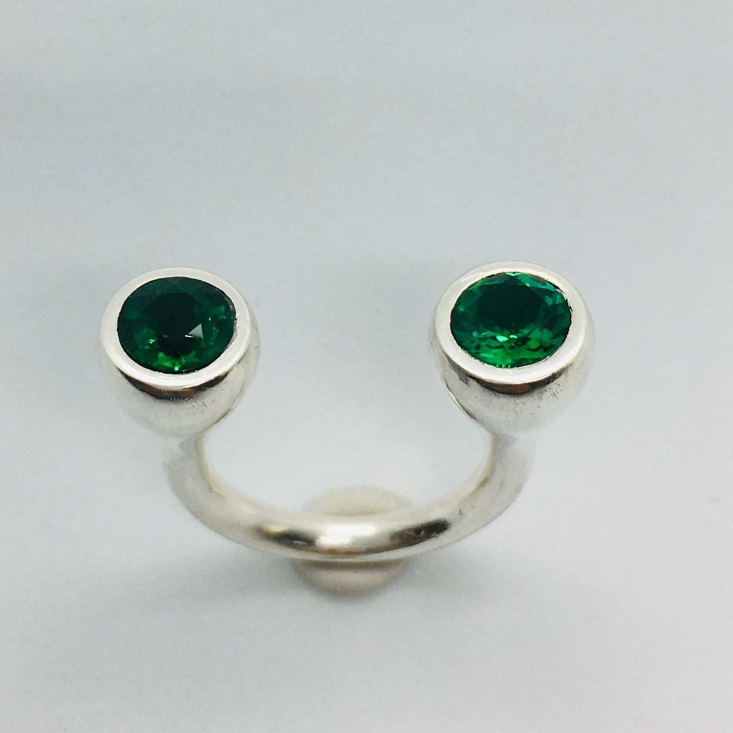 Crescent Stone Sterling Silver Ring with Green Emeralds
