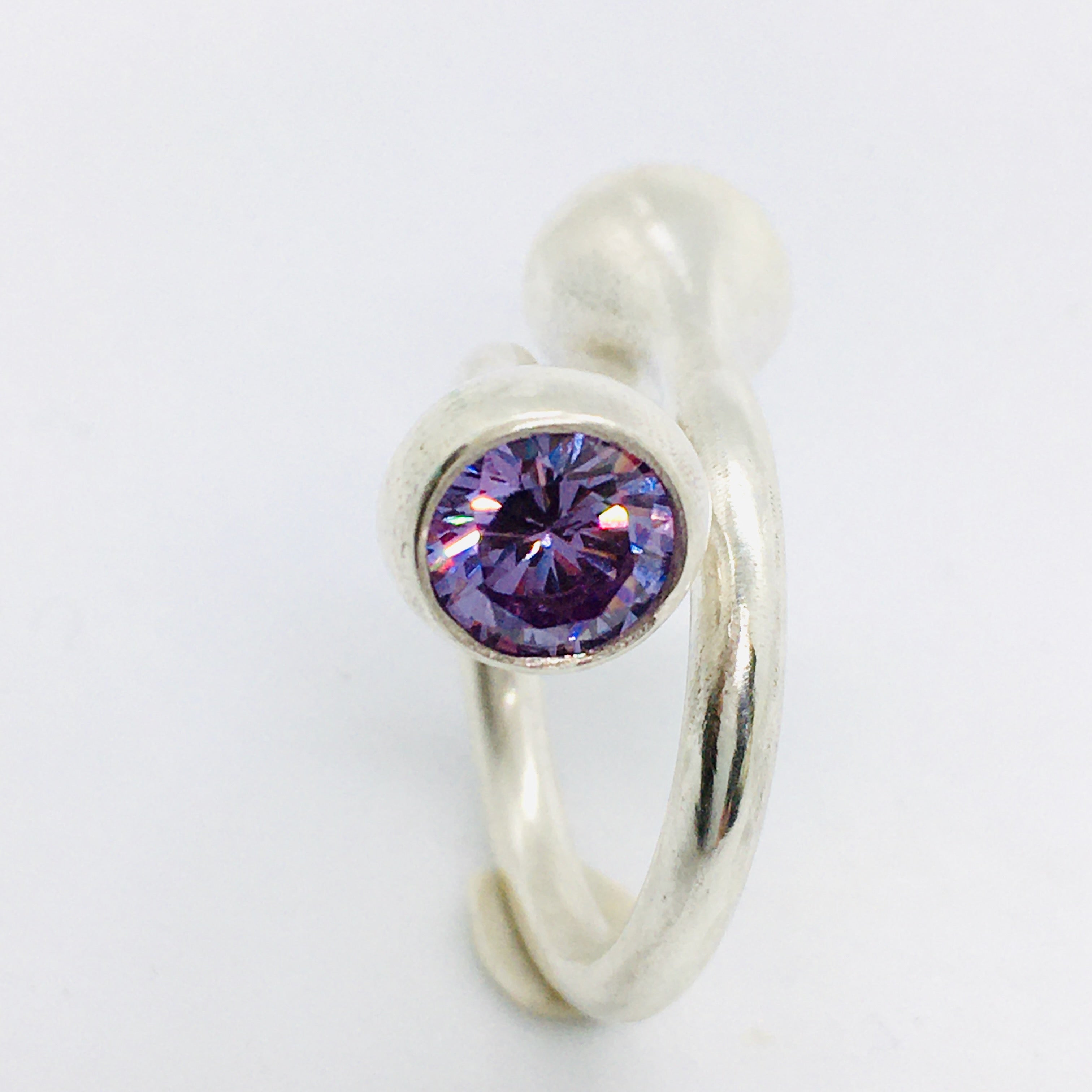 Twisted Gum Nut Ring with Lavender Cubic Zirconia