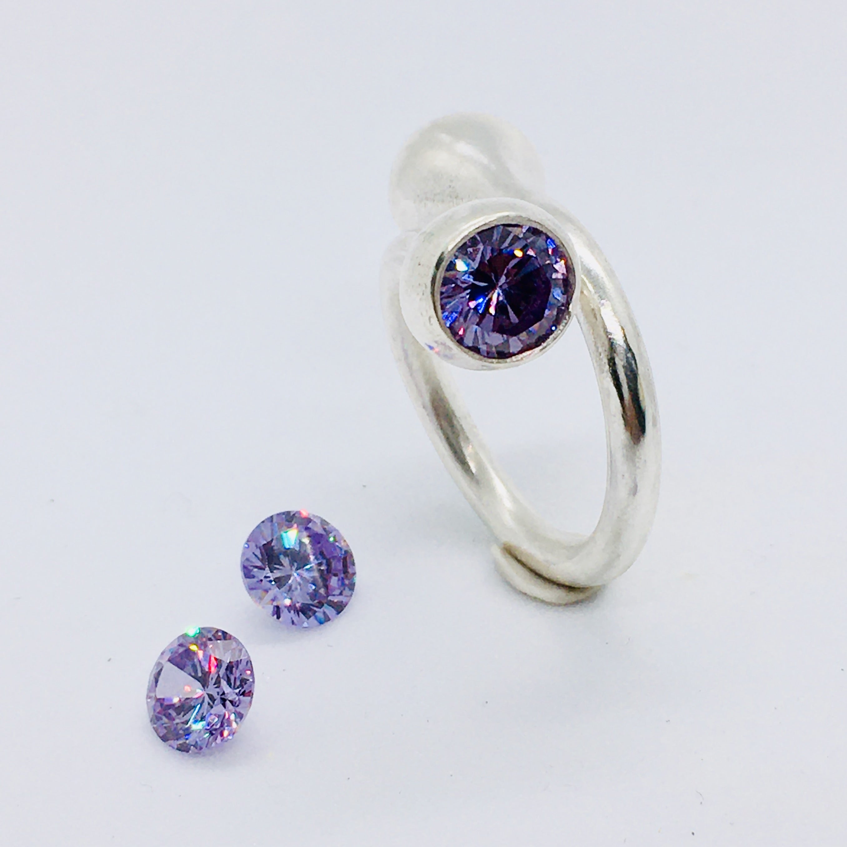 Twisted Gum Nut Ring with Lavender Cubic Zirconia