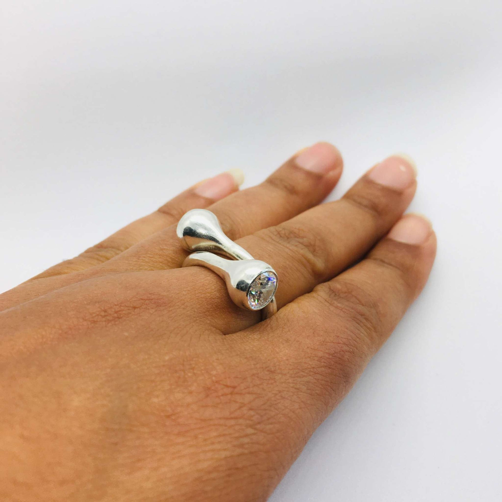 Twisted Gum Nut Ring on Hand flat by Rahaima.com